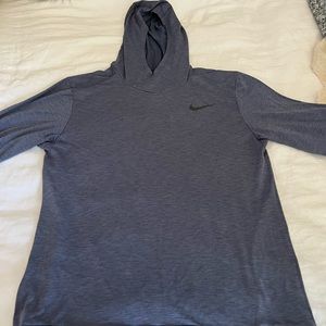 Blue Nike men’s training hoodie. Dri-fit material. Good condition size large.